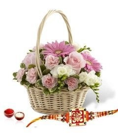 18 White And Pink Flowers In Basket With Rakhi
